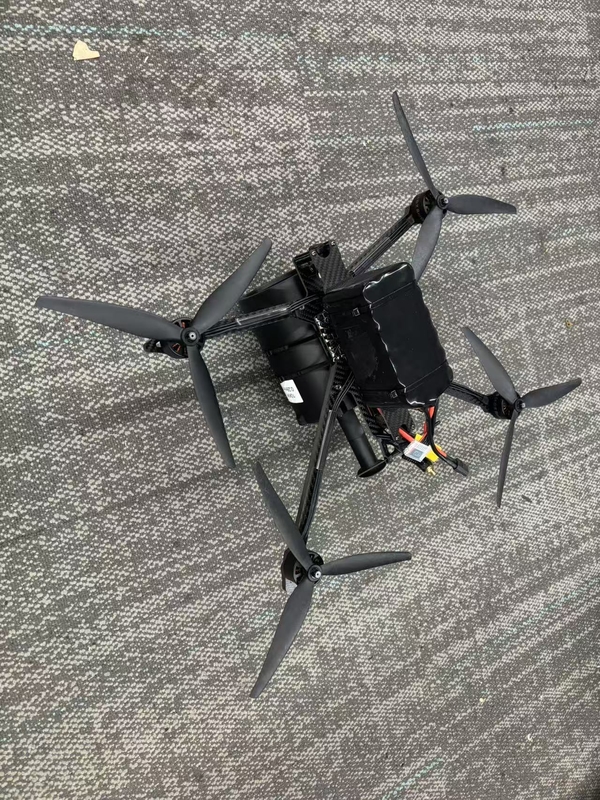 Конфиденциальное покрытие пиджак материал FPV квадрокоптер дрон 25 км / руль Внутренняя к внешней проводке FC тип соединителя для высокой прочности натяжения